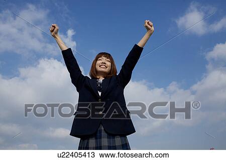 High School Student Holding Arms Up View Large Photo Image Stock Image - High School Student Holding Arms Up. Fotosearch