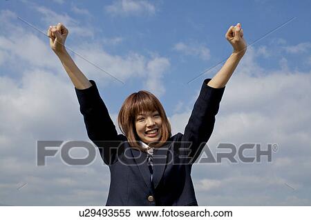 High School Student Holding Arms Up View Large Photo Image Stock Photography - High School Student Holding Arms Up. Fotosearch