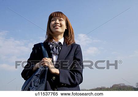 High School Student Looking up at the sky View Large Photo Image Stock Photography - High School Student Looking up at the sky. Fotosearch
