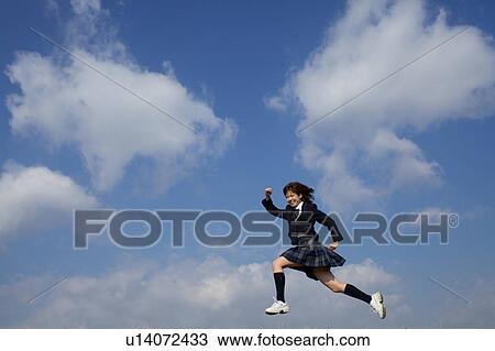 High School Student Running in the air View Large Photo Image Stock Image - High School Student Running in the air. Fotosearch