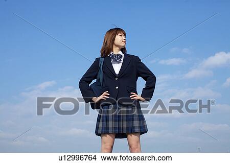 High School Student Taking a pose View Large Photo Image Picture - High School Student Taking a pose. Fotosearch