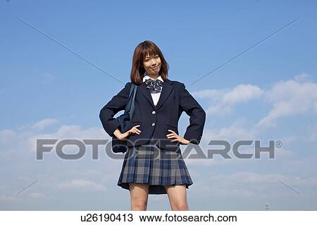 Stock Image - High School Student Taking a pose. Fotosearch