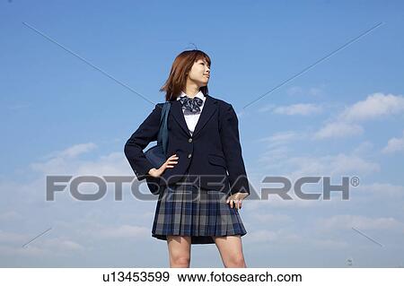 High School Student Taking a pose View Large Photo Image Stock Photo - High School Student Taking a pose. Fotosearch