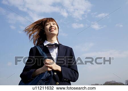 High School Student tossing hair View Large Photo Image Stock Image - High School Student tossing hair. Fotosearch