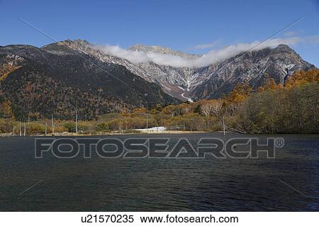 Hodaka peaks and Taisho pond View Large Photo Image Stock Photography - Hodaka peaks and Taisho pond. Fotosearch