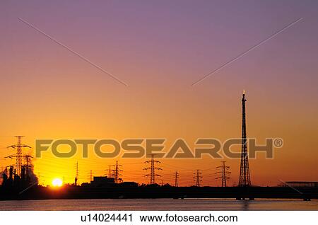 Stock Image - Industrial District at Dawn. Fotosearch