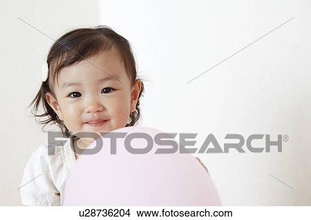 Japanese Baby Girl Holding Balloon View Large Photo Image Picture - Japanese Baby Girl Holding Balloon. Fotosearch