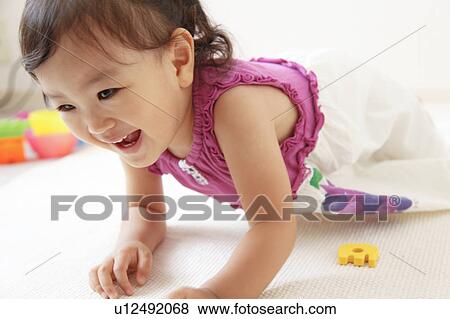 Japanese Baby Girl Playing View Large Photo Image Stock Photo - Japanese Baby Girl Playing. Fotosearch