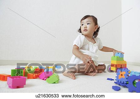 Japanese Baby Girl Playing with Toys View Large Photo Image Stock Image - Japanese Baby Girl Playing with Toys. Fotosearch