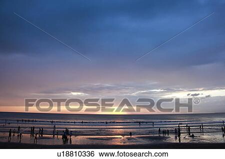 Kuta beach at dusk, Bali, Indonesia View Large Photo Image Stock Photograph - Kuta beach at dusk, Bali, Indonesia. Fotosearch