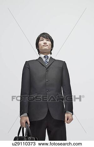 Low Angle View of Businessman View Large Photo Image Stock Image - Low Angle View of Businessman. Fotosearch