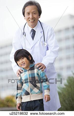 Male Doctor and Boy View Large Photo Image Stock Image - Male Doctor and Boy. Fotosearch