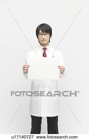 Male Doctor Showing Blank Message View Large Photo Image Stock Photo - Male Doctor Showing Blank Message. Fotosearch