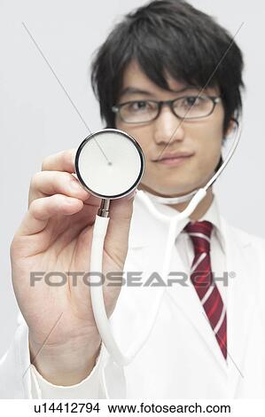 Male Doctor with Stethoscope View Large Photo Image Picture - Male Doctor with Stethoscope. Fotosearch