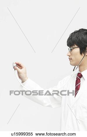 Male Doctor with Stethoscope View Large Photo Image Stock Photography - Male Doctor with Stethoscope. Fotosearch