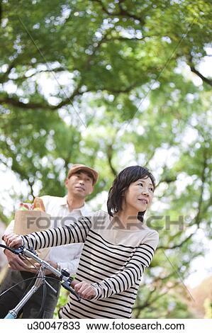 Mature couple after grocery shopping View Large Photo Image Stock Image - Mature couple after grocery shopping. Fotosearch