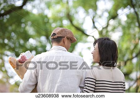 Mature couple after grocery shopping View Large Photo Image Stock Photo - Mature couple after grocery shopping. Fotosearch