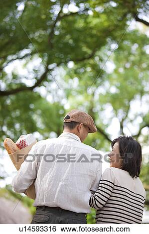 Mature couple after grocery shopping View Large Photo Image Stock Photograph - Mature couple after grocery shopping. Fotosearch