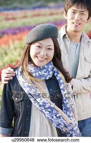 Mid Adult Couple in Field View Large Photo Image Stock Photo - Mid Adult Couple in Field. Fotosearch