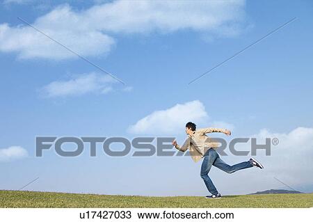 Mid Adult Man Running View Large Photo Image Stock Image - Mid Adult Man Running. Fotosearch