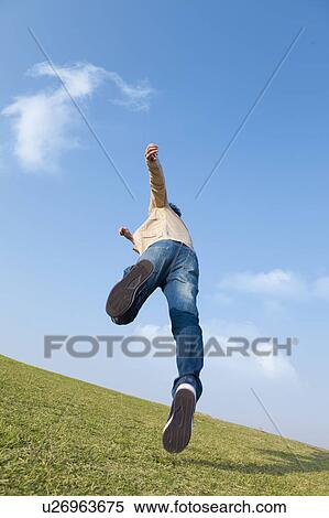 Mid Adult Man Running View Large Photo Image Stock Photography - Mid Adult Man Running. Fotosearch