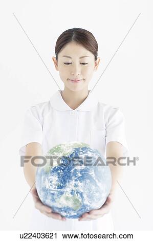 Mid Adult Man with Globe View Large Photo Image Stock Image - Mid Adult Man with Globe. Fotosearch