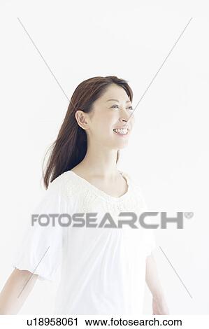 Mid Adult Woman in White View Large Photo Image Stock Image - Mid Adult Woman in White. Fotosearch