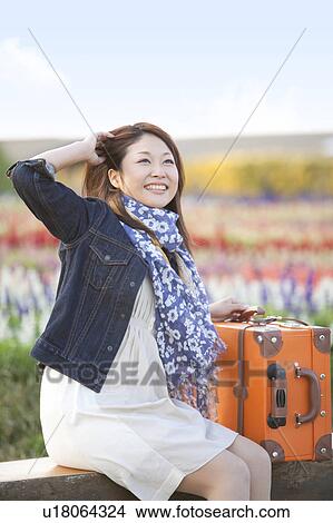 Mid Adult Woman Traveling in Countryside View Large Photo Image Picture - Mid Adult Woman Traveling in Countryside. Fotosearch