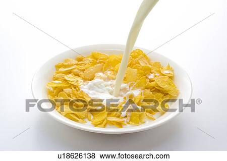 Milk Being Poured Onto Cornflakes View Large Photo Image Stock Photo - Milk Being Poured Onto Cornflakes. Fotosearch