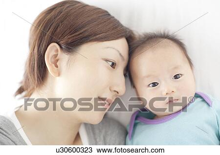 Stock Image - Mother and Newborn Baby. Fotosearch
