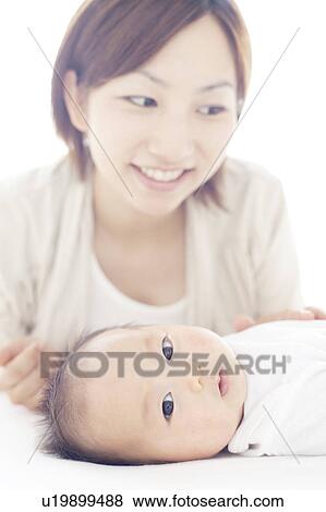 Stock Photo - Mother and Newborn Baby. Fotosearch