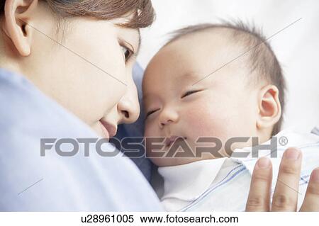 Stock Photography - Mother and Newborn Baby. Fotosearch