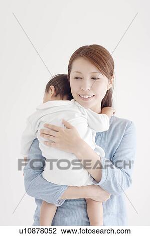 Stock Image - Mother and Small Baby. Fotosearch