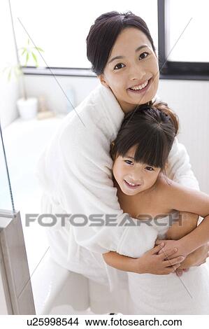 Mother Embracing daughter View Large Photo Image Picture - Mother Embracing daughter. Fotosearch