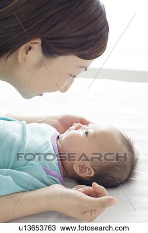 Mother Face To Face With Newborn Baby View Large Photo Image Stock Image - Mother Face To Face With Newborn Baby. Fotosearch