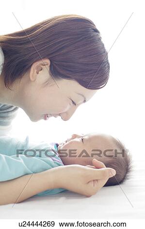 Mother Face To Face With Newborn Baby View Large Photo Image Stock Photo - Mother Face To Face With Newborn Baby. Fotosearch