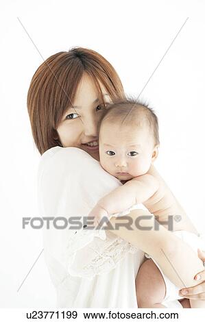 Mother Holding Newborn Baby View Large Photo Image Stock Photo - Mother Holding Newborn Baby. Fotosearch