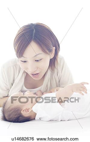Mother Looking at Newborn Baby View Large Photo Image Stock Photograph - Mother Looking at Newborn Baby. Fotosearch