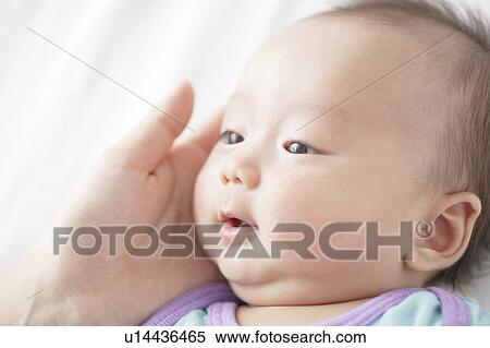 Mother Touching Newborn Baby's Face View Large Photo Image Stock Photography - Mother Touching Newborn Baby's Face. Fotosearch
