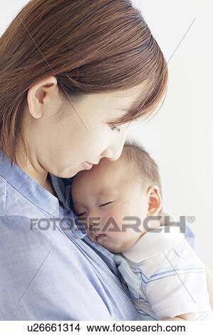 Picture - Mother with Newborn Baby. Fotosearch