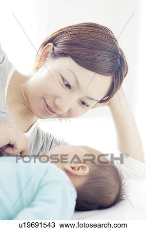 Mother with Newborn Baby View Large Photo Image Stock Image - Mother with Newborn Baby. Fotosearch