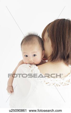 Stock Image - Mother with Newborn Baby. Fotosearch