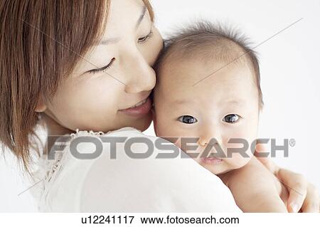 Stock Photo - Mother with Newborn Baby. Fotosearch