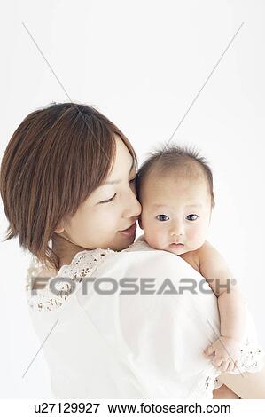 Stock Photo - Mother with Newborn Baby. Fotosearch