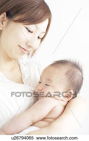 Stock Photography - Mother with Newborn Baby. Fotosearch