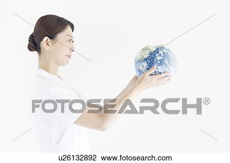Nurse Holding Up Globe View Large Photo Image Stock Image - Nurse Holding Up Globe. Fotosearch