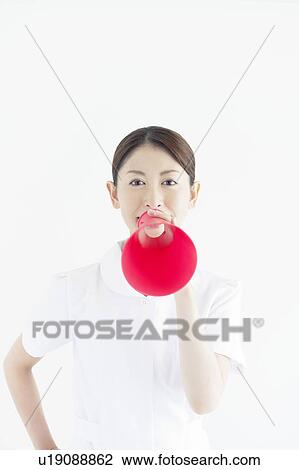 Nurse Talking Into Megaphone View Large Photo Image Stock Image - Nurse Talking Into Megaphone. Fotosearch