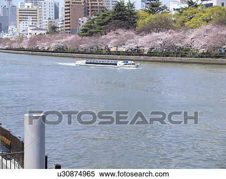 Stock Photography - Ookawa river and nautical vessel, Osaka Prefecture, Honshu, Japan. Fotosearch