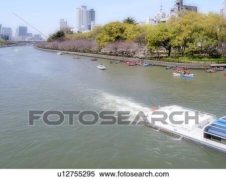 Stock Photography - Ookawa river and nautical vessels, Osaka Prefecture, Honshu, Japan. Fotosearch
