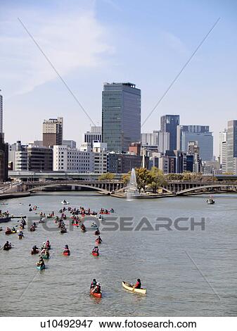 Ookawa river and people canoeing, Osaka Prefecture, Honshu, Japan View Large Photo Image Stock Photo - Ookawa river and people canoeing, Osaka Prefecture, Honshu, Japan. Fotosearch